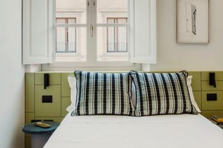 Détail des coussins dans la chambre simple Supérieure