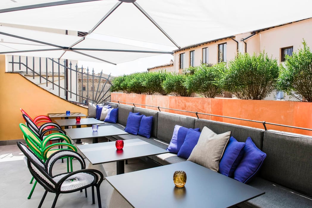 Terrace with seating at Hotel Milù